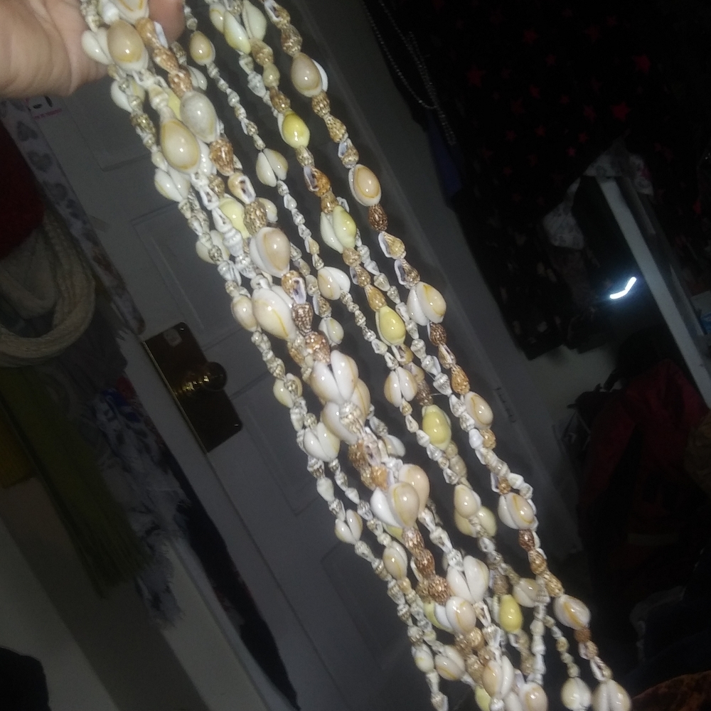 Natural sea shell leis - cowrie necklaces